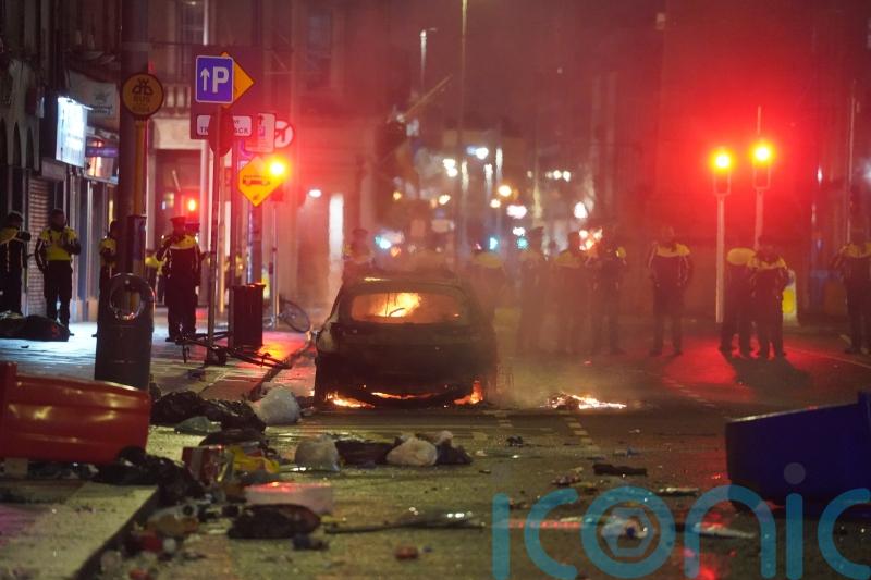 Police condemn ‘gratuitous thuggery’ as rioting breaks out after knife attack