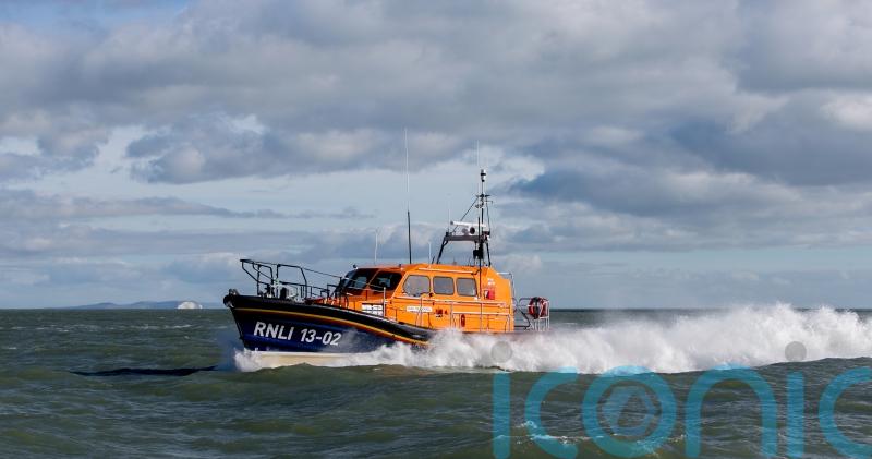 Pockets of air in coat kept girl afloat after she was swept out to sea
